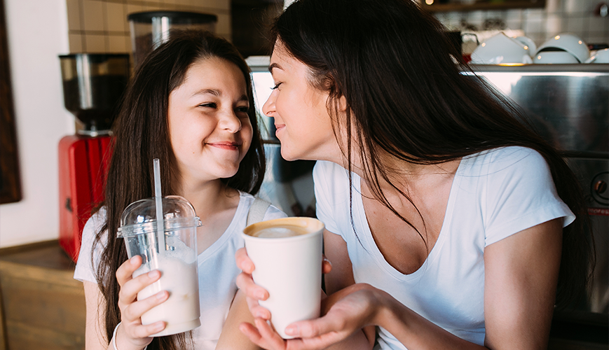 Mother and Daughter Drinking Coffee