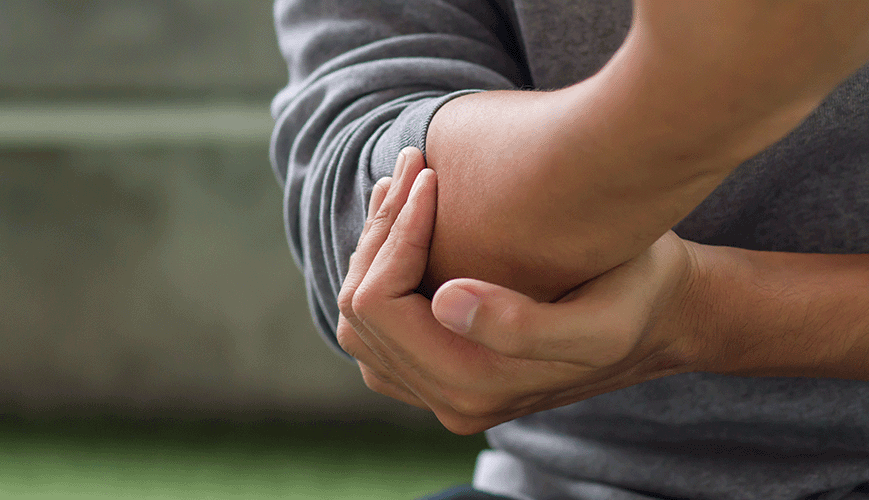 Man with Tennis Elbow Pain