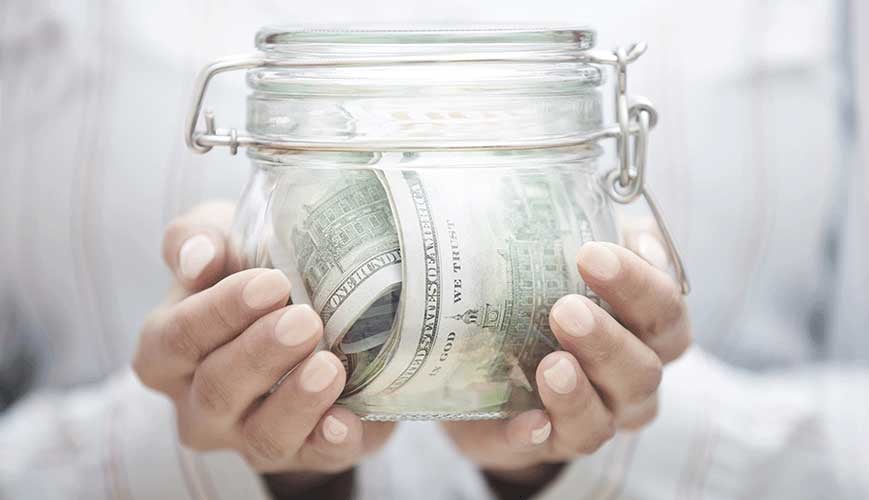 Jar of Saved Money from Reduced Health Care Costs