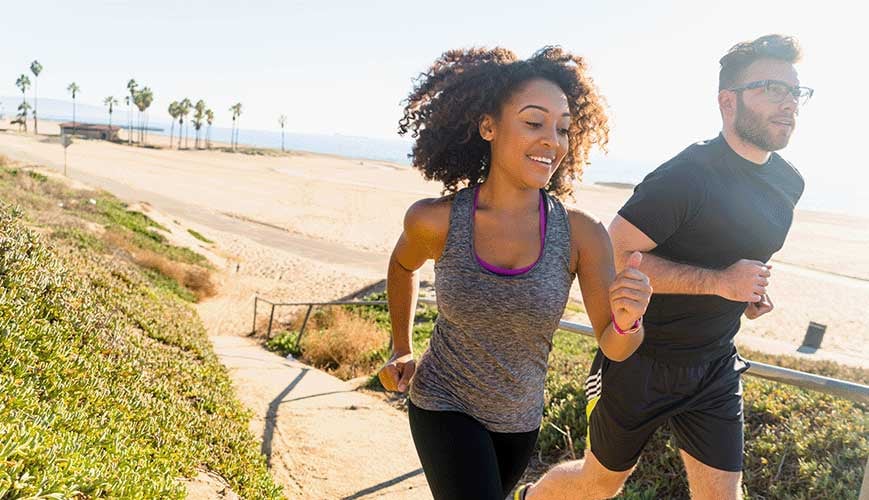 Couple Running on Beach