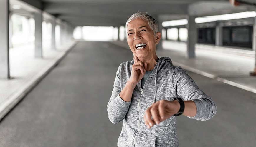 Woman in Her 50s Checking Time and Pulse