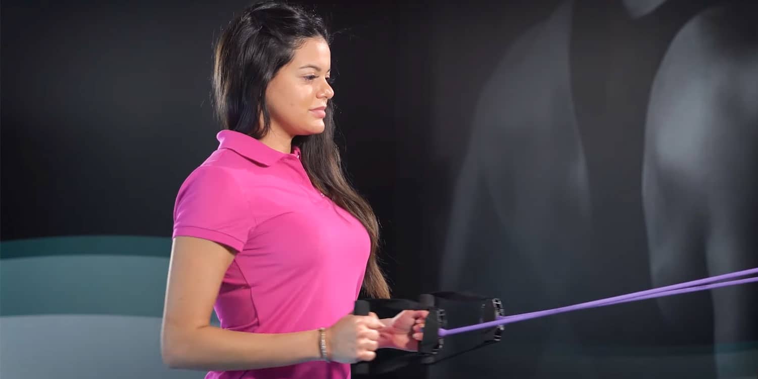 Neck mobility exercises for posture: woman performing a resistance band row to strengthen the upper back and support rounded shoulders.
